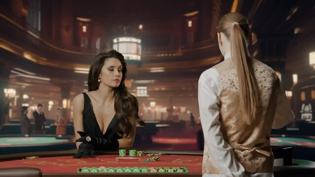 Portrait of elegant woman in black dress on casino background. Attractive woman at blackjack poker table, croupier deals cards, woman bets. Concept of casino and gambling.