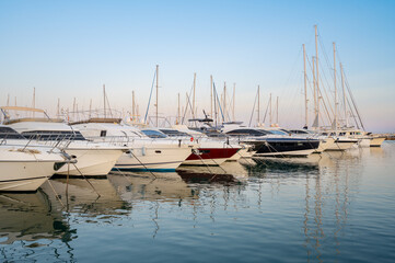 Fototapeta na wymiar Scenic view of Yatchs moored at Cambrils dock at sunset, Catalonia, Spain. High quality photo