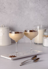 Food photography of dessert, panna cotta; vanilla; milk; cream; chocolate nibs, italian; pudding; gelatine; mousse