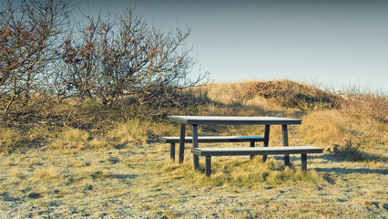 Picnic table and benches in winter