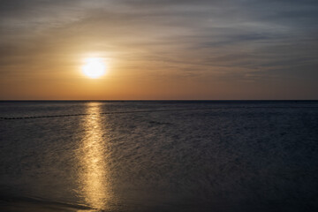 Landscape by the sea in Greece on the island of Rhodes. Sunrise, dramatic clouds. Beautiful background.