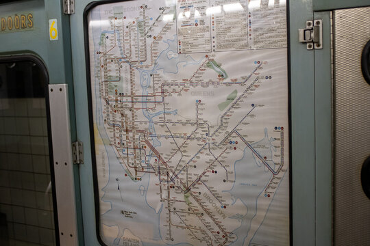 a metro map on the wall of a subway station in new york