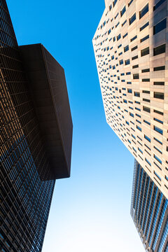 Low angle view of modern office buildings in the financial area of Poblenou in the city of Barcelona in Catalonia in Spain