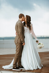 bride and groom first meeting on the roof of skyscraper