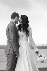 bride and groom first meeting on the roof of skyscraper