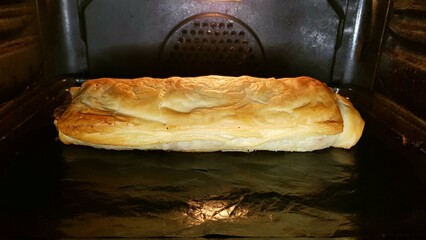 homemade Sauerkraut strudel with puff pastry