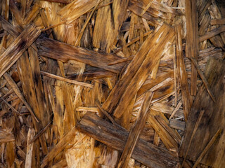 Pressed wood. Wood background. Pattern made of pressed sawdust.