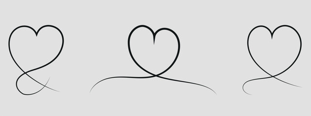 A set of three black hearts. Hand painted. Black. Vector on a gray background