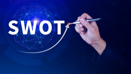 Businessman drawing swot analysis strategy diagram for business plan and growth. SWOT analysis concept.