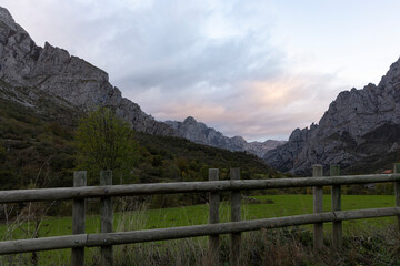 Fototapeta na wymiar Sunrise landscape over Picos de Europa national park in northern Cantabrian mountains of Spain during bright and sunny autumn day