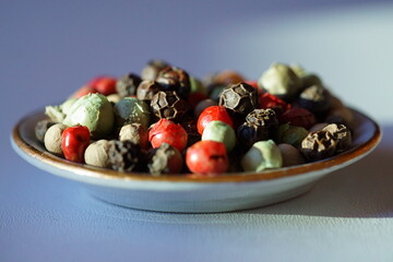 Beautiful background with multicolored peppercorns