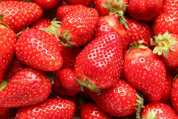 Texture of fresh strawberries as background
