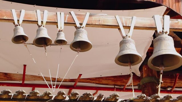Bells are ringing in the old church bell tower. Religious holidays and celebrations.