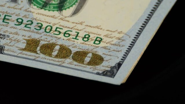 Closeup of The US Dollar bill's security feature, denomination printed with Color Shifting ink for better identification. 