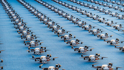 multiple drones lined up for a drone show