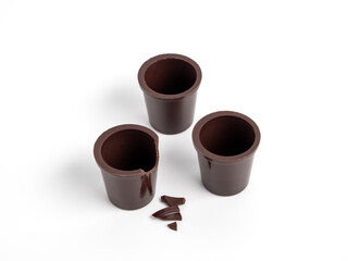 A glass of chocolate on a white background. Chocolate cup close up
