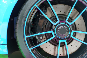 Alloy wheel with calipers and racing brakes of the sport car