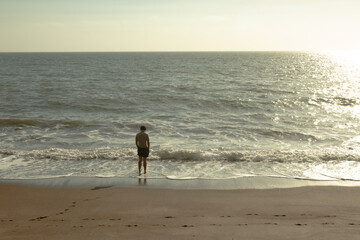 man alone at the beach
