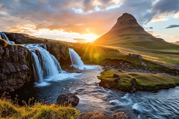 Photo sur Plexiglas Kirkjufell Sunset over Kirkjufellsfoss Waterfall and Kirkjufell Mountain, an iconic Icelandic landscape that blends majestic silhouettes, reflecting rivers and waterfalls, and the ethereal play of sunlight