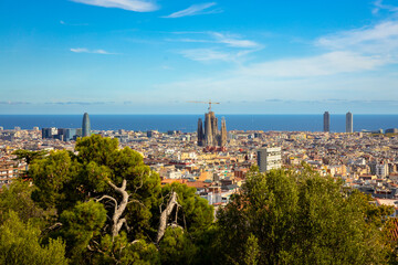 Barcelona, Spain, 03 October 23. The view of Barcelona from the Park of Guell, designed by the architect Antoni Gaudi. - obrazy, fototapety, plakaty