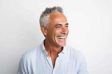 Portrait of happy senior man smiling. Isolated on white background.