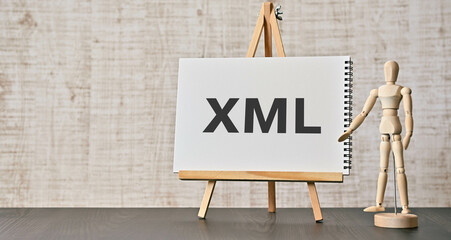 There is wood block with the word XML. It is as an eye-catching image. - obrazy, fototapety, plakaty