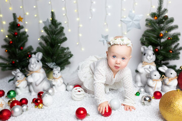 children's New Year's photo shoot. Christmas baby. Christmas card with baby
