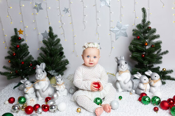 children's New Year's photo shoot. Christmas baby. Christmas card with baby