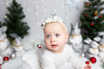 children's New Year's photo shoot. Christmas baby. Christmas card with baby