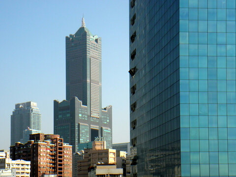Kaohsiung, Taiwan - January 8, 2024: Beautiful view of the 85 Sky Tower (Tuntex Sky Tower) and other modern buildings in downtown Kaohsiung, Taiwan. Kaohsiung is a famous tourist destination in Asia