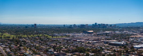 Obraz na płótnie Canvas Phoenix city downtown skyline cityscape of Arizona in USA. Top view of downtown Phoenix Arizona on a summer day in USA.