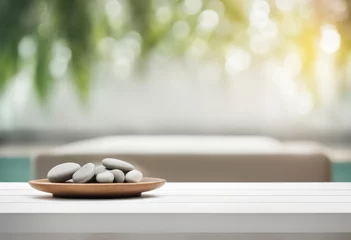  Zen stones in a spa. Empty white table top in front, blurred spa room background. Relaxation banner, generated by AI © SD Danver