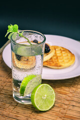 cocktail with lime and mint