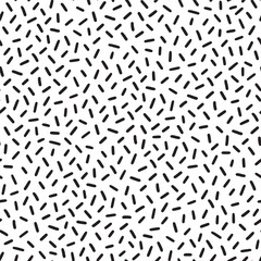Small dash pattern on white background. Hand drawn small black dash seamless pattern. Simple minimal abstract, geometric texture design seamless background. Vector illustration
