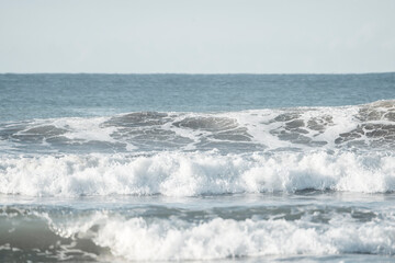 Ocean big wave coming with foam and sea 