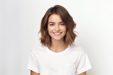 Fototapeta premium Smiling Woman in White Shirt Looking at the Camera