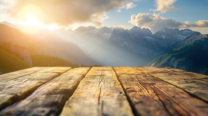 wooden table top with the mountain landscape , flare light background