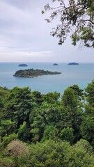 View of some islands in Thailand with sea and vegetation.