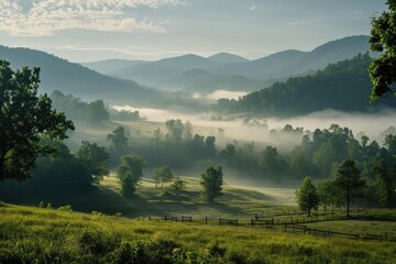 Morning mist rising over a peaceful mountain valley