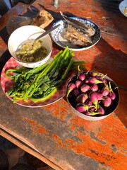 Nam Prik Num , Northern Thai Green Chilli Dip ,Thai Vegan paste, blanched vegetables, eggplant on wooden table.