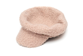 Fototapeta na wymiar winter warm hat with a visor on a white background.