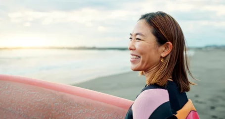 Foto op Canvas Happy, woman and surfer thinking at beach, sea and ocean for summer holiday, travel adventure or hobby. Japanese lady smile with surfing board for water sports, freedom or relax for tropical vacation © Clement Coetzee/peopleimages.com