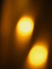 Blurred golden lights for abstract night dark background.