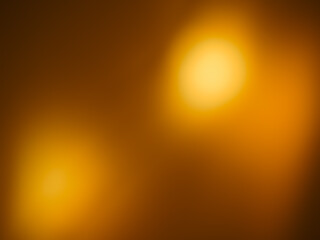 Blurred golden lights for abstract night dark background.