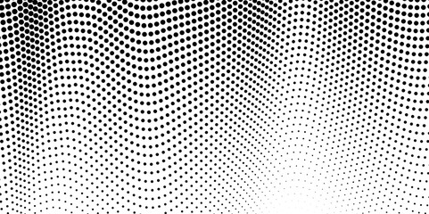 Halftone dotted texture grunge background. Abstract black and white halftone dotted background.
