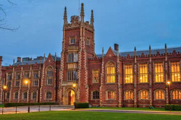 The imposing main building of the Queens University in Belfast at twilight