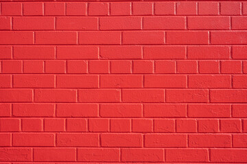 Background from a wall made of red painted bricks