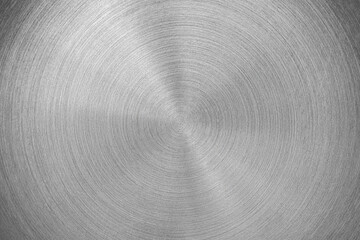 Stainless steel or aluminium circular brushed shiny metal texture. Abstract metallic background....