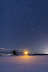 winter time starry sky over the lighthouse