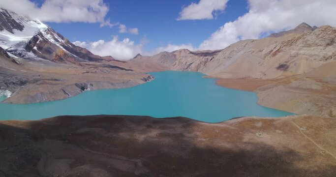 Annapurna Mountain Circuit has mesmerizing views for Tourists visiting World's Highest-altitude Lake Tilicho at Manang Nepal, Drone shot landscape, country wealth 4K